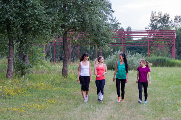 istock Friendly sport women walking and talking 1216128169