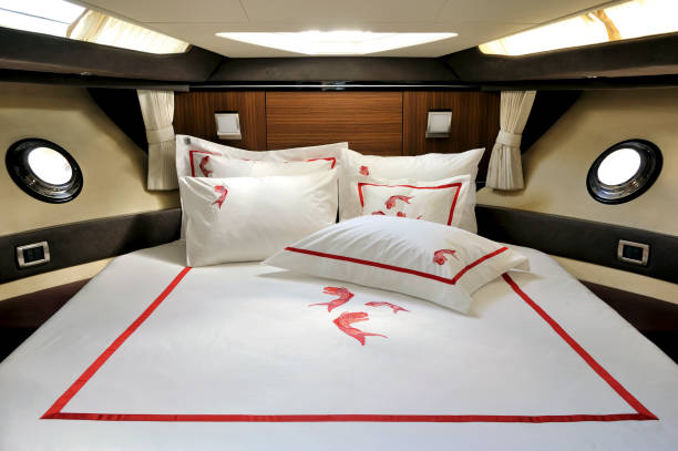 Sheet set with fish pattern in sailboat cabin