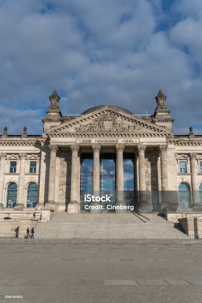 German Bundestag, Berlin Facade of the Berlin Reichstag building seen from Platz der Republik, the former Königsplatz, during the city's lockdown due to the COVID-19 spreading Architectural Column Stock Photo