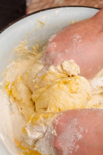 istock Cooking dough in a white plastic bowl at home 1216132038