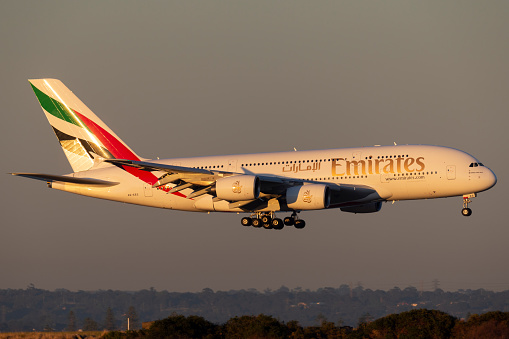 Sydney, Australia - October 9, 2013: Emirates Airbus A380 four engined large passenger aircraft landing at Sydney Airport.