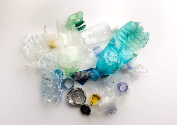 istock Heap of plastic garbage isolated on white background 1216133342