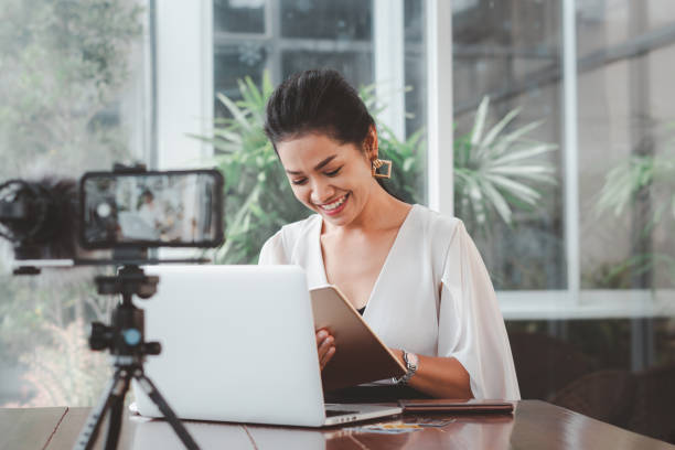istock Young student woman use wireless internet learning and co-working at home on mobile tablet app. Modern girl people blogger couch on laptop education classroom online device, Social distancing in space 1216134146