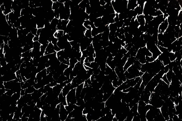 istock Cracked glass texture on black background 1216134834