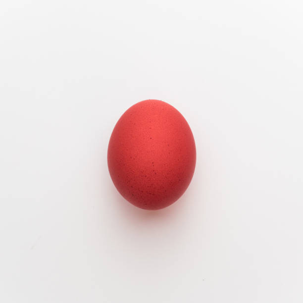istock Red chicken easter egg molecule. Minimal virus or coronavirus outbreak holiday concept. White background 1216135669
