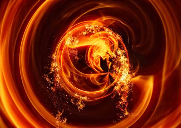 istock Abstract flame swirling in the dark 1216137856