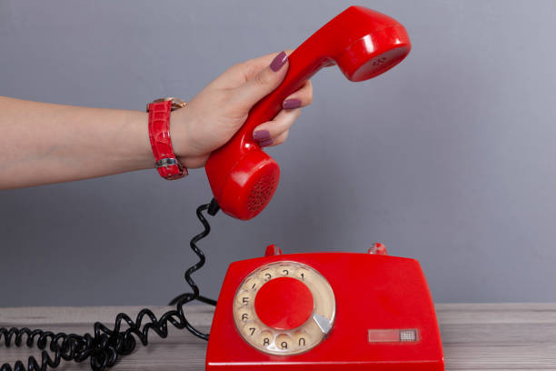 istock woman hand vintage phone 1216139930
