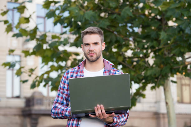 istock Urban WiFi. Digital solution for business. Entrepreneur developer inspired by nature. Man developer hold laptop. Inspired for start up. Handsome guy with computer. Web developer. Software concept 1216142801