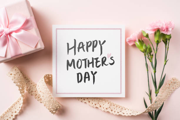 istock top view of carnation with card on pink background 1216143859
