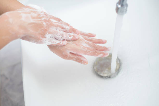 istock A woman is washing hands 1216148622