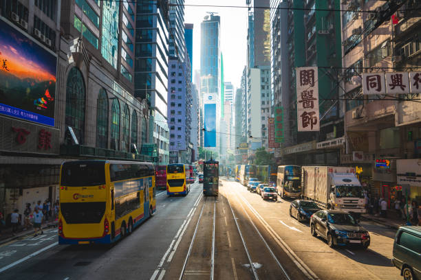 istock Hong Kong street scene in Wan Chai tramway path 1216148922