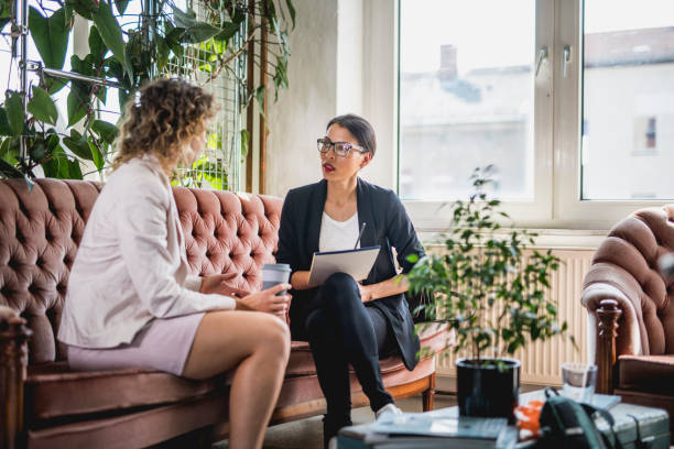 istock Young Businesswoman Conversing in Eclectic Office Space 1216149034