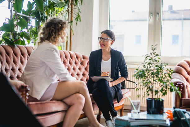istock Young Businesswoman Conversing in Eclectic Office Space 1216149035