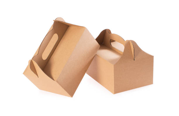 istock Composition of two Cardboard Gift Packaging Boxes with Handle for Cake. Paperboard Packaging Container Template for Wedding Party Decoration for your design. Clipping path included. 1216149243