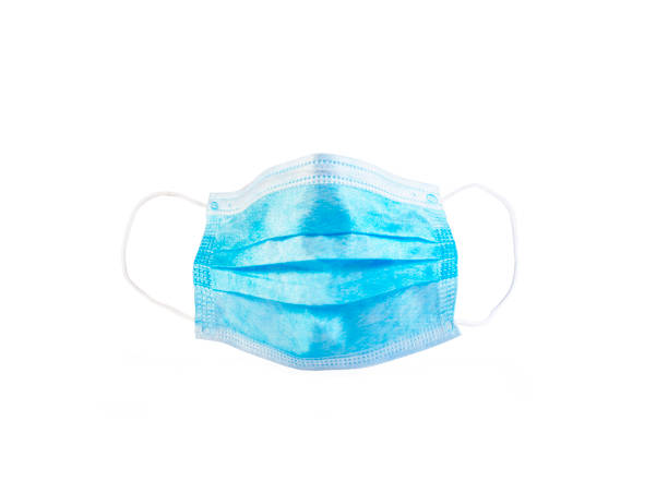 istock Medical surgical ear-loop mask isolated on white background. Coronavirus, flu protection concept. 1216151085