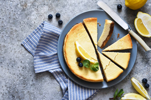 istock New York lemon cheesecake on a concrete background. 1216154022