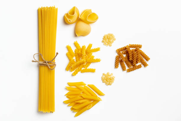 istock Raw italian spaghetti and pasta on a white background 1216154208
