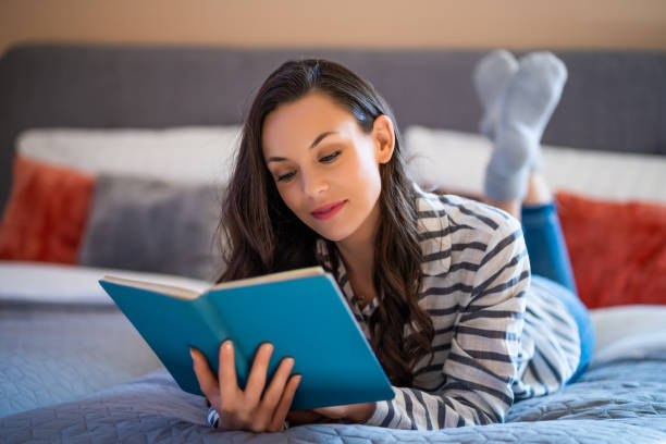 istock Young woman relaxing at home 1216158808