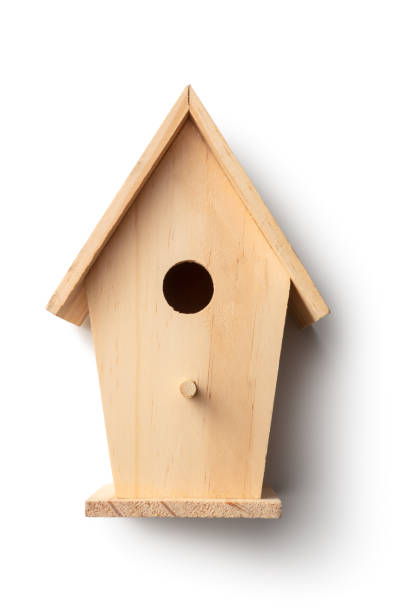 istock Gardening: Wooden Birdhouse Isolated on White Background 1216159032