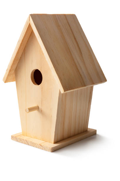 istock Gardening: Wooden Birdhouse Isolated on White Background 1216159035