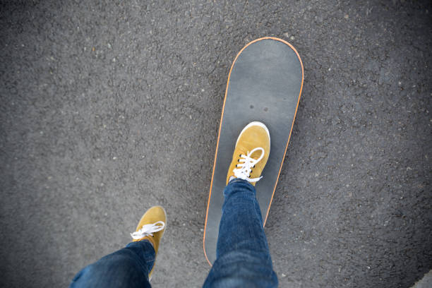 Skateboarder skateboarding  on highway road