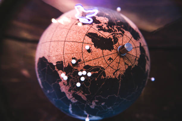 istock Close up on a push pin world cork globe 1216161965
