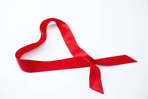istock Red ribbon in heart shape, valentines concept. 1216162405