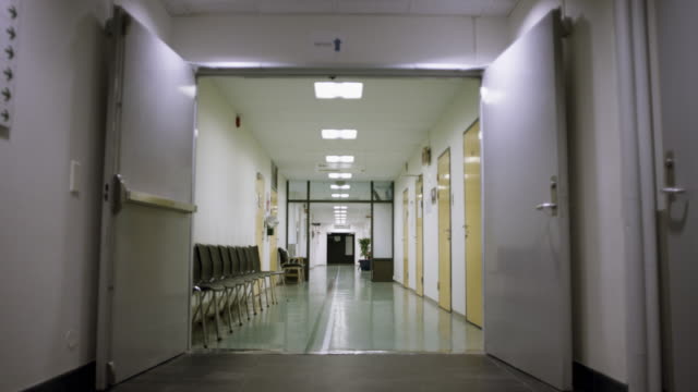 Dolly shot of empty hallway at a hospital