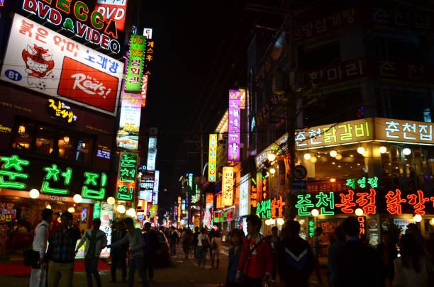 A night view of Seoul restaurant street with Colourful signboard. Itaewon International Area Popular With local restaurant and a place for Foreigners to experience local food. dong stock pictures, royalty-free photos & images