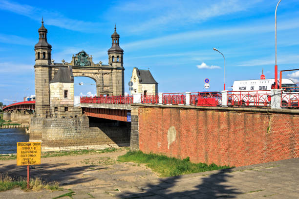 Sovetsk, Russia - June 21, 2019: Prussian Queen Louise bridge, border road bridge over the Nemunas (Neman) river in Sovetsk (Tilsit, or Tilze), Kaliningrad region. Text: Danger zone, no tresspassing!