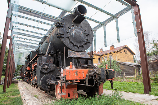 Vilnius, Lithuania - June 14, 2019: Memorial of deportations to Siberia near Naujoji Vilnia railway station with train and vans exposition. In 1940-1941 the Soviet government did mass deportation to Siberia from Naujoji Vilnia railway station.