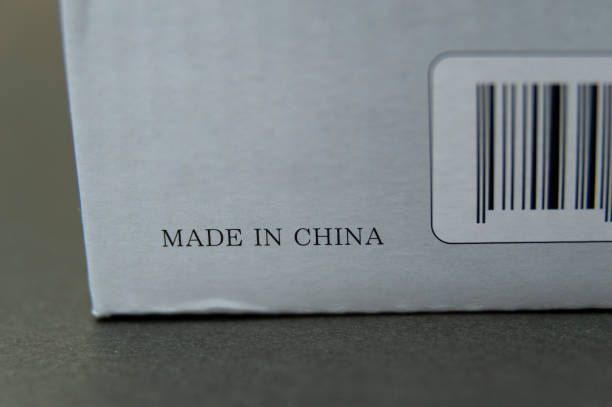 gray cardboard box with bar code written: made in china. - china business industry bar code imagens e fotografias de stock