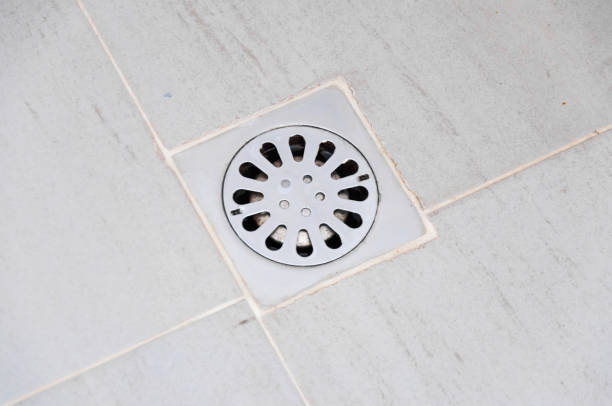istock old chrome shower drain set in a shower 1216170088