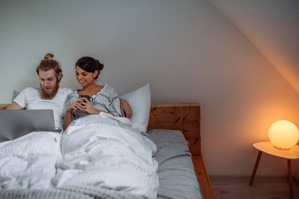 istock Weekends are for series in bed 1216171865