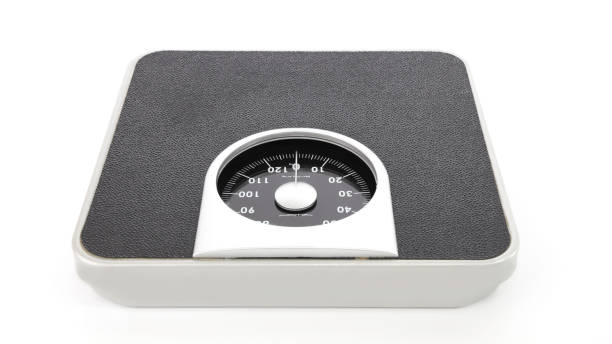 istock Analog weight scale as isolated on white background 1216172966