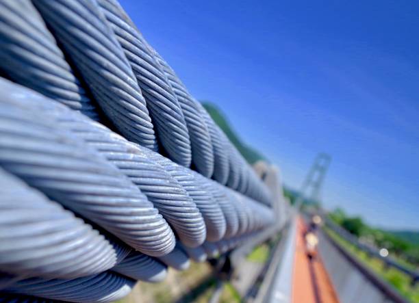 Suspension Bridge Cable Abstract shot of cable used to hold up the Mizunogo Daitsuribashi suspension bridge a Lake Miyagase Park. wire rope stock pictures, royalty-free photos & images