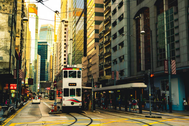 istock Hong Kong street scene in Wan Chai tramway path 1216177608