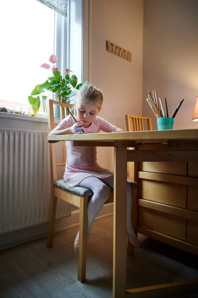 istock Drawing at the table like a grownup 1216180019
