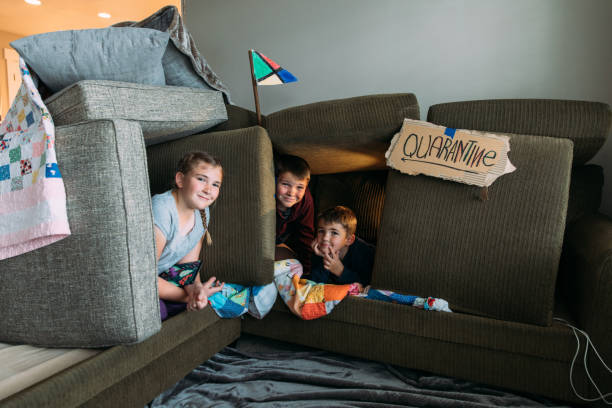 istock Children in Couch Fort 1216180795