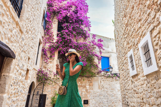 istock Attractive woman exploring old streets in Ibiza 1216180955