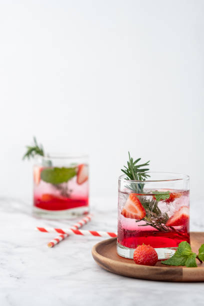 istock Summer strawberry drink on marble white background. 1216181840