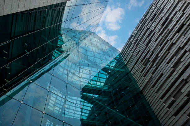 istock Looking up at skyscrapers in the city 1216182496
