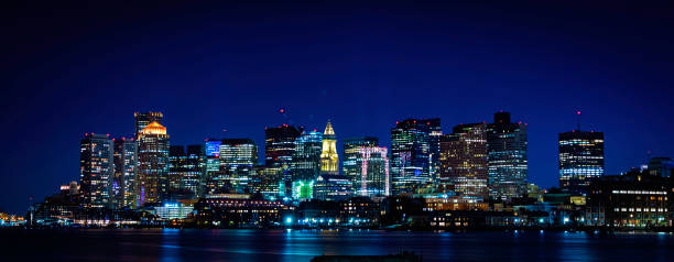 Panoramic Night Cityscape Boston Skyline over Boston Harbor