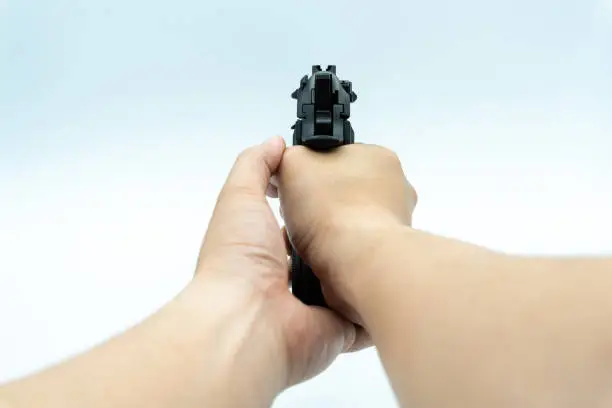 Photo of Model gun shot on white background