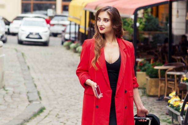 istock Business woman walks down street. 1216186861
