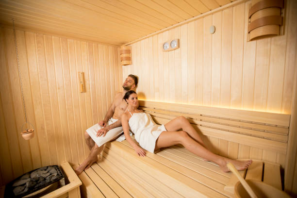 istock Young couple relaxing in the sauna 1216187016