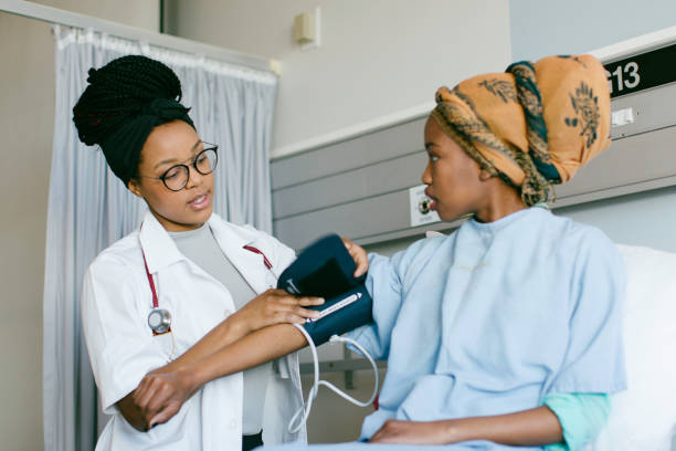 istock A Doctor preparing to take a Patients Blood Pressure 1216187290