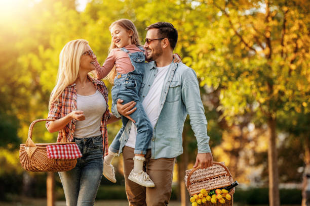 istock Family on picnic at sunny day 1216191666