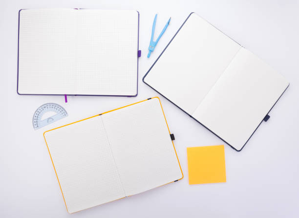 istock school accessories and supplies with paper notebook at table background 1216193216