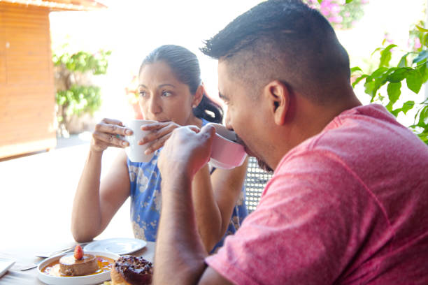 istock Latin adult couple, drinking coffee 1216194925